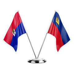 Two table flags isolated on white background 3d illustration, haiti and liechtenstein