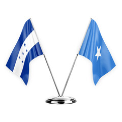 Two table flags isolated on white background 3d illustration, honduras and somalia