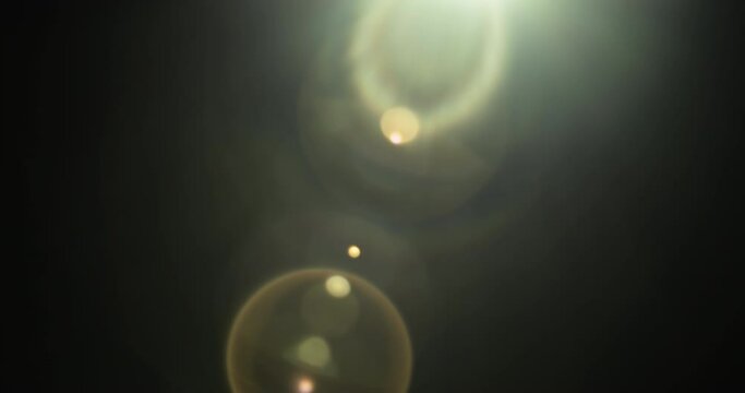 Beautiful pack of four lens flare overlays in slow motion. 