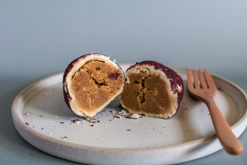 Baked sweet potato, made from mochi bread with Purple Sweet Potato inside. Food photography concept for background