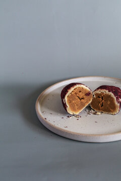 Baked sweet potato, made from mochi bread with Purple Sweet Potato inside. Food photography concept for background