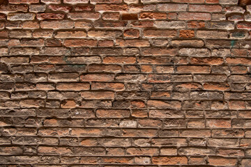 Fototapeta premium Brick wall structure of an old house