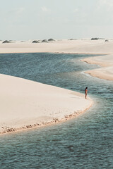 Lençóis Maranhenses - Silhouette of a girl in the dunes during summer in this brazilian national park