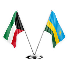 Two table flags isolated on white background 3d illustration, kuwait and rwanda