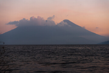 Fototapeta na wymiar Volcano sunset on Lake Atitlan in Guatemala. 