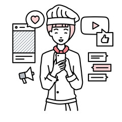 立ってスマートフォンでさまざまなSNSで楽しく交流する調理師の女性
