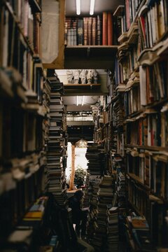 Person sitting on chair in library