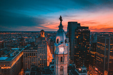 William Penn statue in Pennsylvania cityscape at sunset in Philadelphia, US
