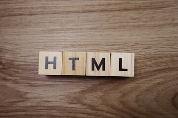 HTML word letter on wooden background