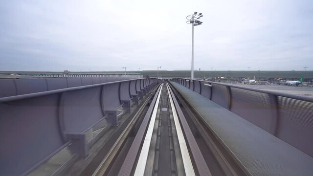 Inter-terminal Shuttle Moving On Railway Between Terminals Of Paris-CDG Airport In Paris, France. POV