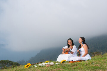 Indigenous women playing an instrument. Happiness: Make music outdoors. Sensation of free life....