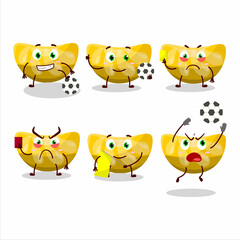 Orange gummy candy cartoon character working as a Football referee