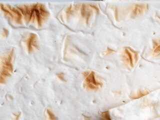 Refrained Asian Bread Lavash Close-up. yeast-free pita bread