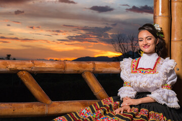 Traditions and cultures of the world: Colombian woman in typical folk dance costume. Colombia and...