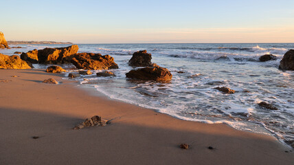Fototapeta na wymiar Malibu coastline and waves at sunset