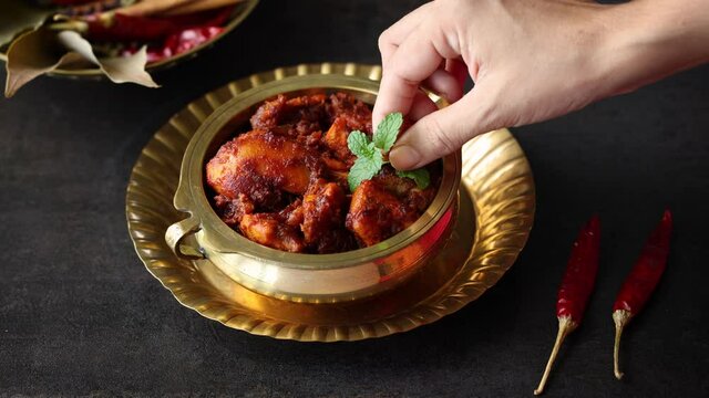 Fried chicken Kebab Kabab Chicken Tikka Masala woman hand serving chicken fry 4K video footage chicken 65 Bangalore Kerala Hyderabad South India Sri lankan Indian non veg food.
