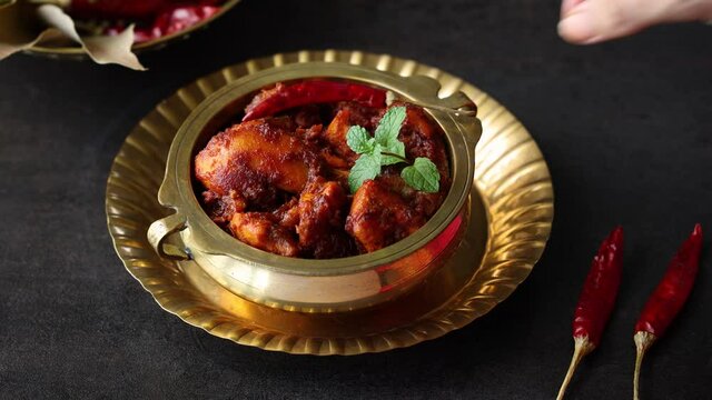 Fried chicken Kebab Kabab Chicken Tikka Masala woman hand serving chicken fry 4K video footage chicken 65 Bangalore Kerala Hyderabad South India Sri lankan Indian non veg food.
