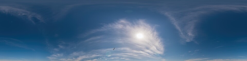Blue sky panorama with Cirrus clouds. Seamless hdr 360 degree pano in spherical equirectangular format. Complete zenith for 3D visualization, game and sky replacement for aerial drone 360 panoramas.