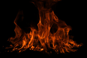 Fire flames on black background. Fire burn flame isolated, abstract texture. Flaming effect with...