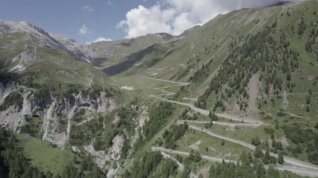 video with drone side plane over the stelvio pass
