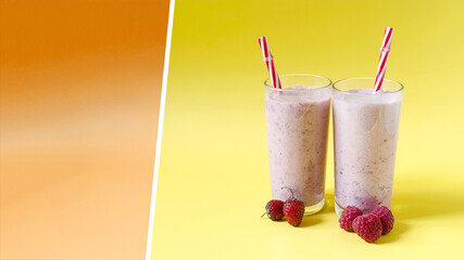 Berry milkshakes in transparent dishes on a light background divided into two zones. Cocktails of ice cream, milk and berries on a colored background