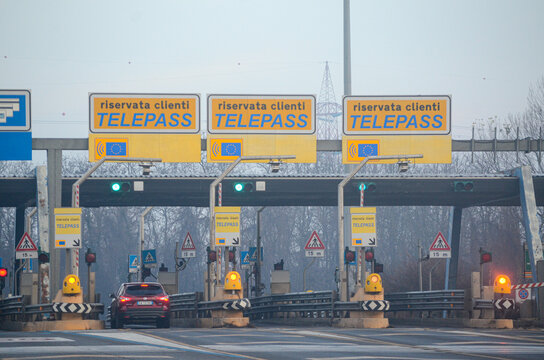 Milan A8 Motorway Milano Laghi, Italy - December 26th 2021 Telepass automatic pass subscription special yellow lanes for non stop driving at the highway payment toll 