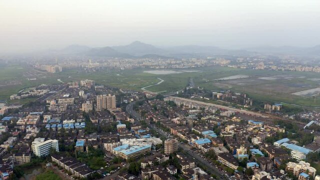 Panoramic View Of Cityscape In Suburban Area Of Vasai, Mumbai, India - aerial drone shot