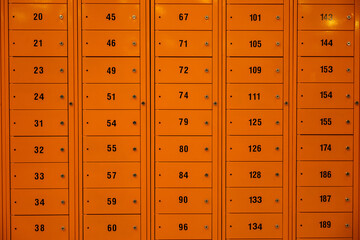 The row of orange post-office letter boxes  
