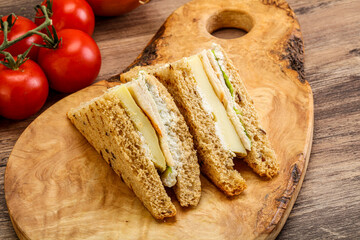 Club sandwich with chicken and cheese