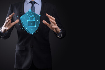 Businessman hold low poly polygon shield with a padlock icon.Secure Access System Concept.Business...