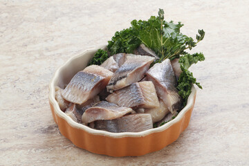Herring fillet slice on the bowl