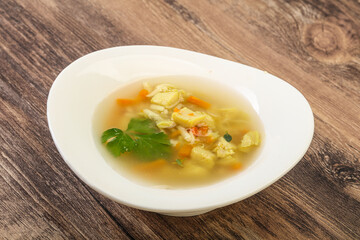 Tasty chicken soup with carrot