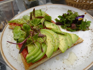 [Peru] Close up of toast with tomato and avocado slices (Cusco)