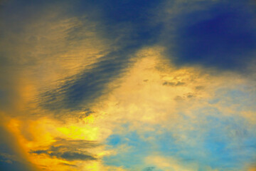 Sky in vibrant colors . Heaven in yellow and blue 
