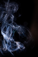 Smoke motion on black background.