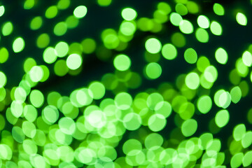 Green abstract bokeh night in city background.