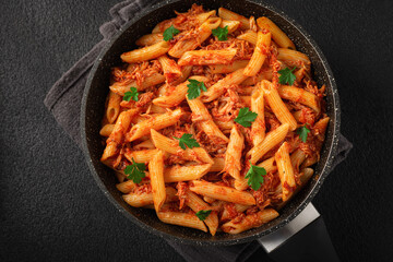 Frying pan CHICKEN PASTA Like an Italian top view close-up