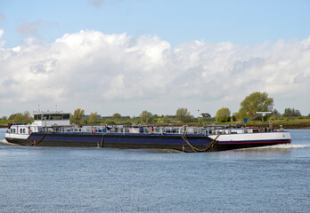 A dutch ship on the river the Lek