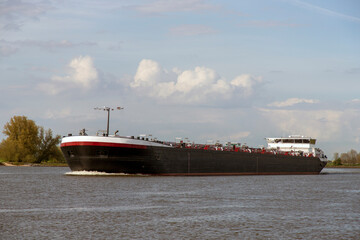 A dutch ship on the river the Lek