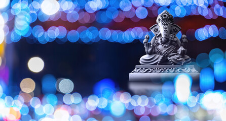 Selective focus on statue of Lord Ganesha, Ganesha Festival. Hindu religion and Indian celebration...