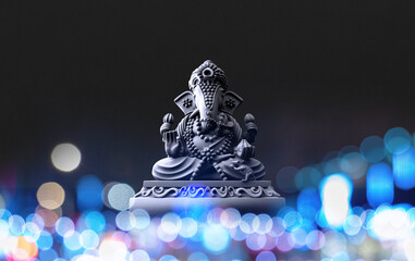 Selective focus on statue of Lord Ganesha, Ganesha Festival. Hindu religion and Indian celebration...