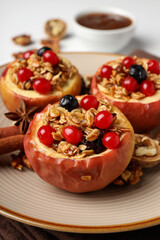 Concept of tasty food with baked apple, close up