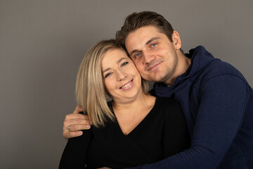 Happy couple studio portrait