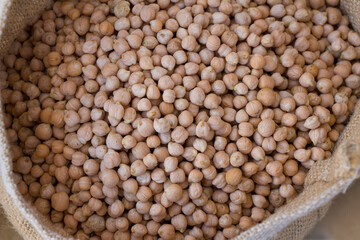 Burlap sack with raw Chickpea or Chia seeds