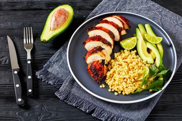 grilled chicken breast with ptitim, avocado, lime