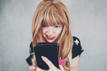 Close up of a woman using her smart phone