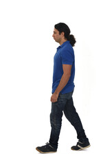 side view of a man dressed in casual clothes with tattoos on white background