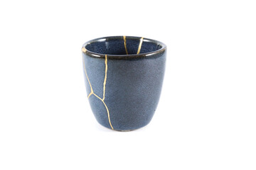 kintsugi gold cracks restoration, Japanese bowl fixed with the antique kintsukuroi restoration...