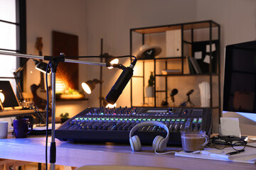 Professional audio equipment in modern radio studio