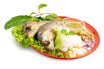 Fried mackerel fish served with fresh vegetables, special spicy sauce and fermented rice flour noodles, organic meal good for health and diet, served on vintage tray on white background. Clipping path